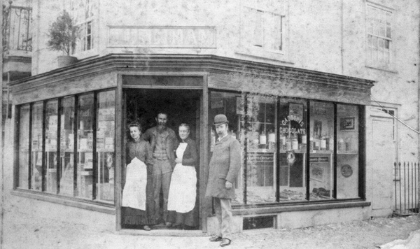 The Turnhams in their shop doorway